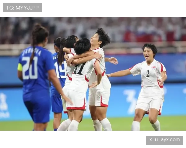 中国足球队亚运赛场展雄风，剑指新辉煌